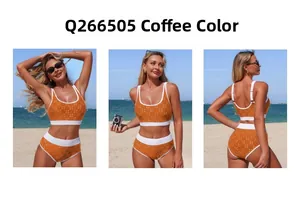 Detailed view of coffee floral bikini with white piping against a beach backdrop