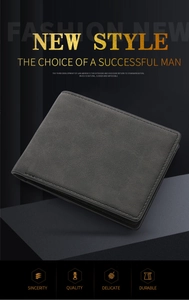 Close-up of minimalist dark grey frosted leather wallet with fine stitching on steps