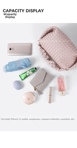 Detail showing high capacity of pink woven bag for phone, wallet, and essentials