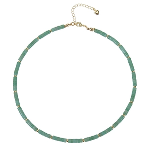 Detail of green turquoise beaded necklace with gold spacer beads and lobster clasp