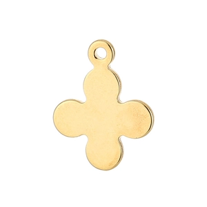 Close-up of polished golden clover pendant with minimalist curved cutout design