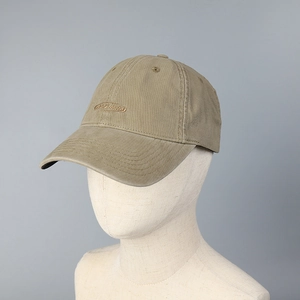 Detailed close-up of khaki baseball cap with BENARA embroidery on a mannequin