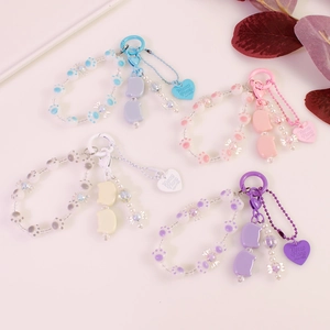 Handmade cat paw beaded charms in pastel colors for bags and keychains