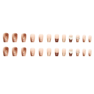Caramel gradient press-on nails with gold foil, 3D heart charms and sparkling rhinestones