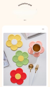 Detailed top view of heat-resistant sakura silicone coasters in multiple bright colors