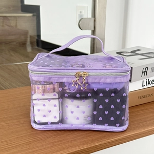 Purple mesh cosmetic bag with heart embroidery and star-shaped zippers for storage