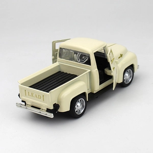 Macro detail of beige vintage pickup toy car showing openable doors and LEAD logo
