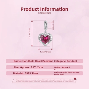 Detail view of heart shaped S925 sterling silver charm with red zircon, size 2.1x1.2cm