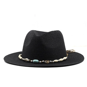 Black straw fedora hat for women with bohemian beaded band and seashell beach accents