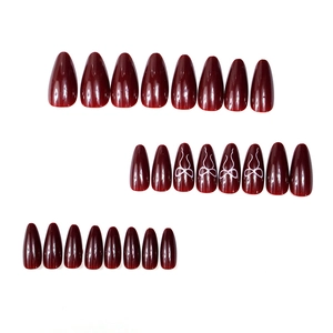 24pcs burgundy almond press-on nails with white bow designs and glossy finish