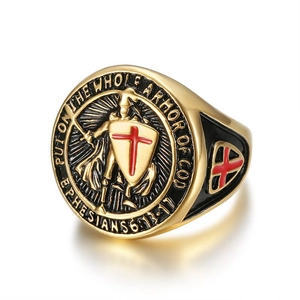 Detail of gold Templar ring with red cross shield and armor of God engraving