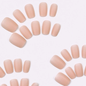 Short square matte nude pink press-on nails with frosted texture in various sizes