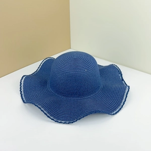 Dark blue wide brim straw hat with elegant lace hollow edges and wavy woven design