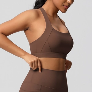 Hoogwaardige cacaobruine yoga-set met racerback sportbeha en nauwsluitende legging
