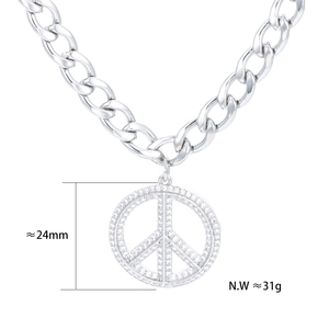 Detail view of peace sign pendant with white zircons on silver chain, 24mm diameter