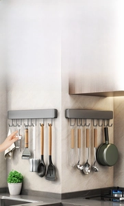 Kitchen wall hook rack showing 90-degree corner installation for spatulas and pans