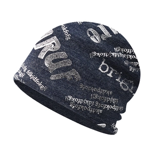 Slouchy knit beanie in dark grey with all-over white alphabet letter print design
