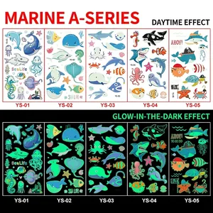 Glow-in-the-dark ocean theme kids tattoos featuring sharks and pirates in day and night view