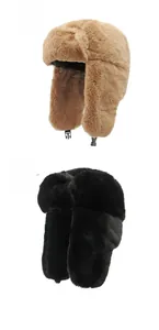 Detail showing plush faux fur texture of khaki and black winter trapper hats with buckles