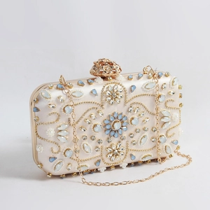 Elegant champagne evening clutch bag with crystal floral pattern and gold flower clasp