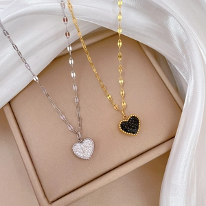 Minimalist titanium steel necklaces with black and white crystal heart pendants