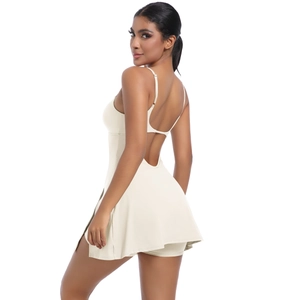 Detail showing back cutout and built-in safety shorts of cream tennis sports dress