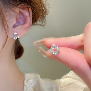 Elegant hollow clover silver needle stud earrings with crystal diamonds for women