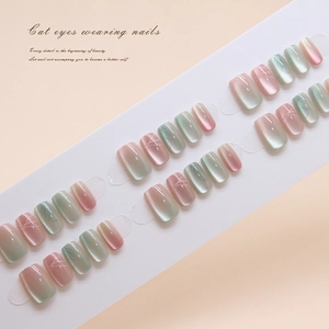 Icy cat-eye short ballerina press-on nails in pink and teal with silver diagonal stripes