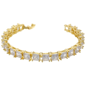 Detail of golden tennis bracelet featuring square-cut clear gemstones and secure clasp