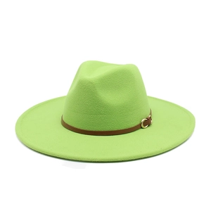 Detail of neon green wool fedora hat featuring a brown leather band and gold metal buckle