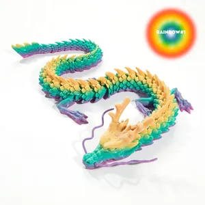 Macro view of 3D printed dragon showing colorful gradient scales and movable joints
