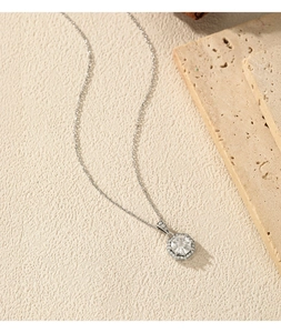Macro detail of S925 sterling silver octagonal necklace with sparkling round cubic zirconia