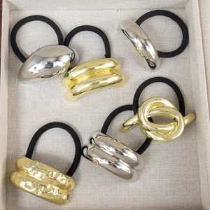 6-piece set of textured metal hair ties in gold and silver finish for women