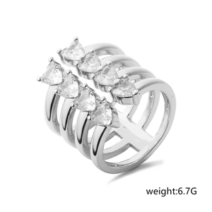 Detail of silver multi-layer open ring featuring eight heart-shaped cubic zirconia stones