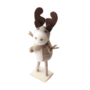 Handmade wool felt reindeer figure on wood base for Christmas tabletop decoration