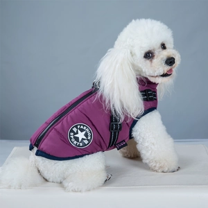 Close-up of a purple quilted dog vest with back buckle and fashion sports logo detail