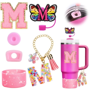 Pink glitter straw cover, letter M keychain, and silicone boot set for Stanley cups