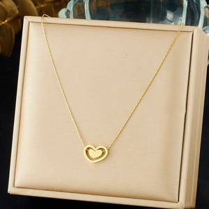 Collier Pendentif Double Coeur Acier Inoxydable Plaqué Or Design Creux Bijoux Élégants Minimalistes Pour Femmes Quotidien
