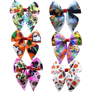 Set of six colorful Halloween grosgrain ribbon hair bows with festive pumpkin and ghost prints