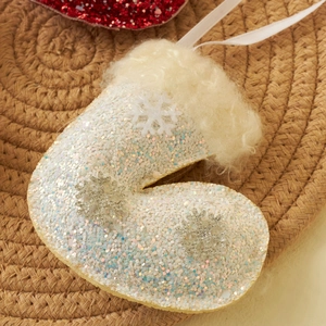 White sequin Christmas boot ornament with faux fur trim and silver snowflake details