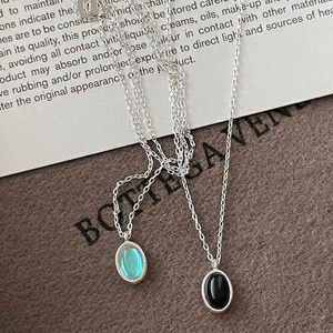 Elegant 925 sterling silver oval pendant necklaces with blue and black gemstones