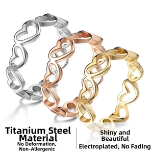 Three-color titanium steel rings with hollow heart designs in silver, gold, and rose gold