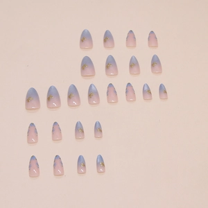Almond almond cat eye press-on nails set with blue pink gradient, butterfly, and flower art