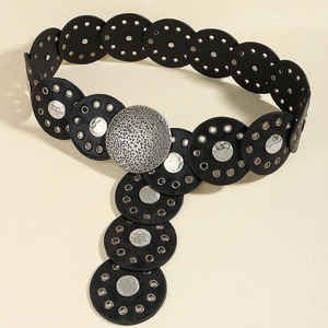 Macro view of black vintage baroque PU leather belt with silver rivets and metal buckle