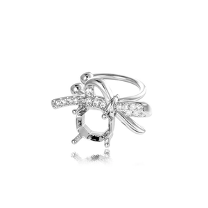 Silver bee ear cuff earring with sparkling rhinestones and wings on a white background
