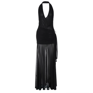 Detail view of black halter dress featuring pleated texture and sheer mesh skirt panels