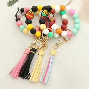 Colorful silicone bead bracelet keychain with Easter rabbit charm and leather tassel