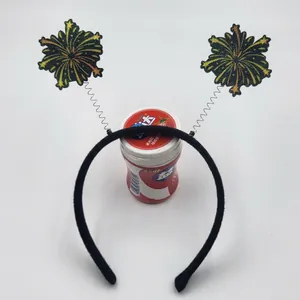 Detail of fireworks headband with glitter stars on springs for holiday party outfits