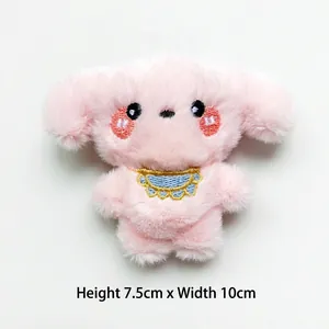 Detail of pink plush puppy doll accessory with size H 7.5cm and W 10cm on white background