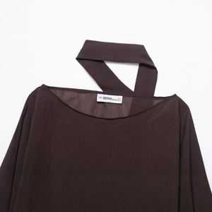 Women's dark brown crew neck top with rivet scarf cape design and asymmetric neck detail